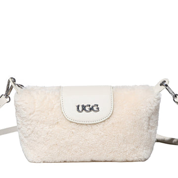 Sam sheepskin shoulder bag in beige with silver UGG logo on white leather flap
