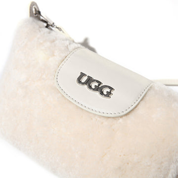 UGG Sam sheepskin shoulder bag showing soft natural sheepskin texture